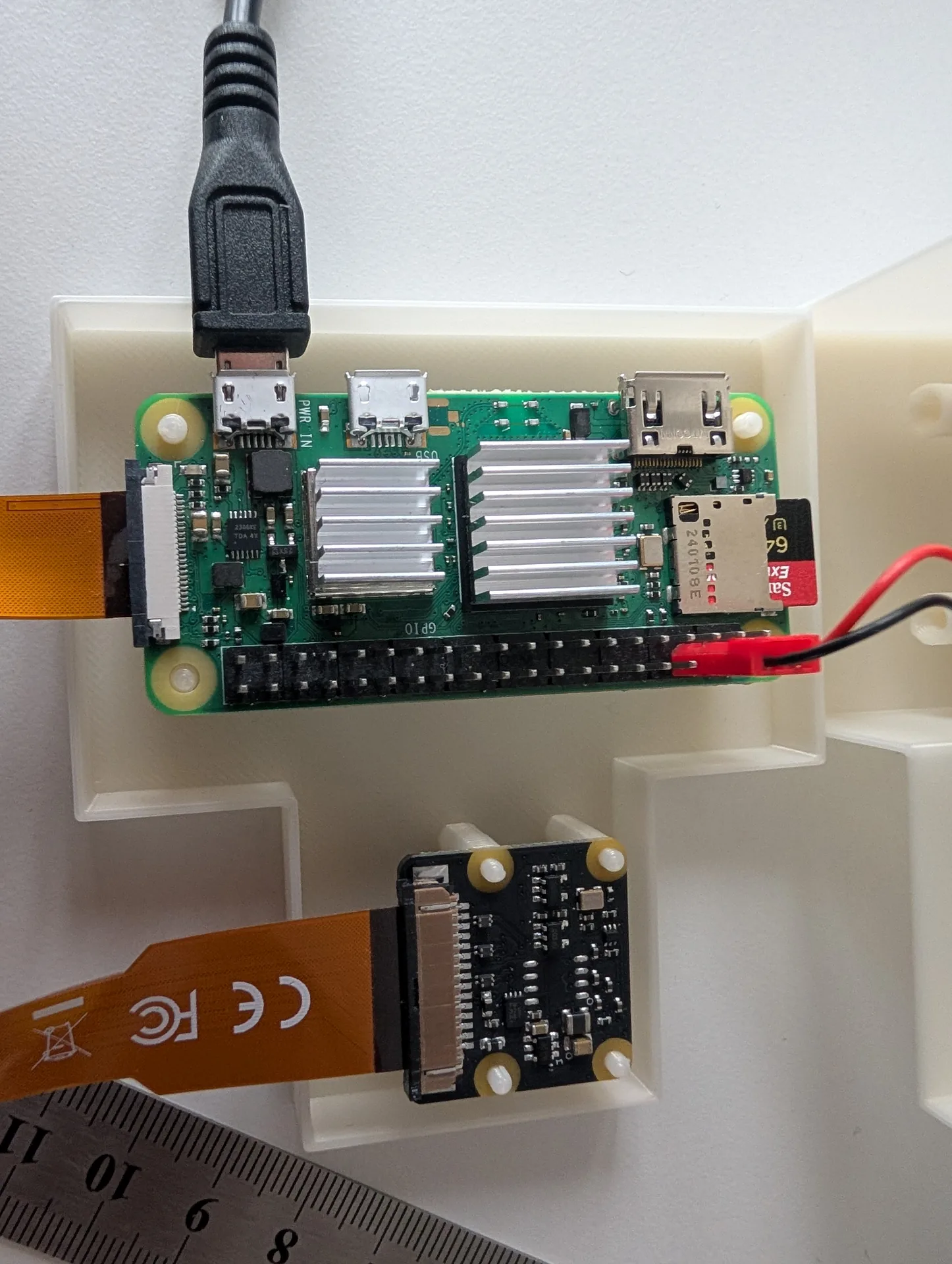 Raspberry Pi Zero 2 W and camera inside enclosure